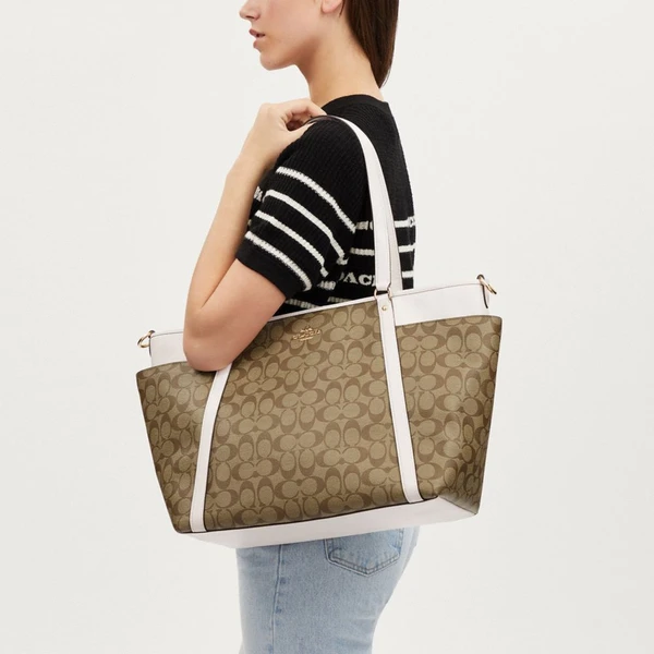 COACH Baby Bag In Signature Canvas | Shipzee.com